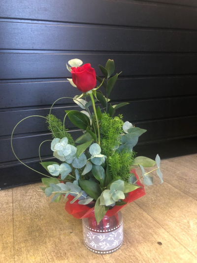 A Little Treasure - Leave a lasting impression with this single red rose, presented in a glass vase.